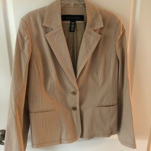 Tan jacket, 2-buttons, 2- pockets. 97% cotton, 3% Spandex. Size 16.